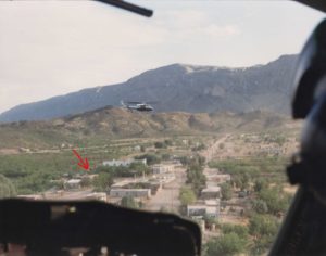 View of Santa Elena from the cockpit of one of the Mexican federal police helicopters. The police helicopters were escorted through U.S. territory by an FBI helicopter, allowing them to attack Acosta by surprise. Acosta holed up in an adobe house marked by a red arrow.